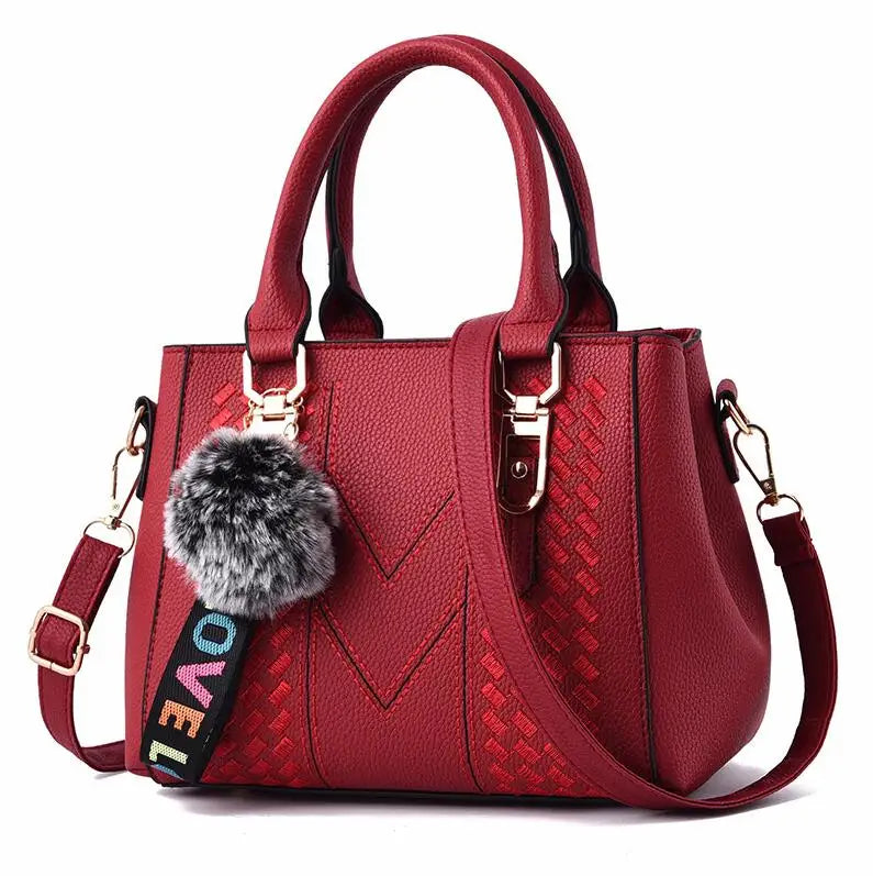 Sac à bandoulière brodé en cuir – Femme