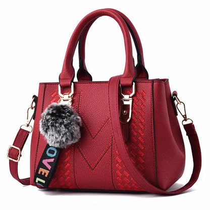 Sac à bandoulière brodé en cuir – Femme