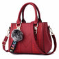Sac à bandoulière brodé en cuir – Femme