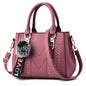 Sac à bandoulière brodé en cuir – Femme