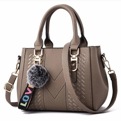 Sac à bandoulière brodé en cuir – Femme