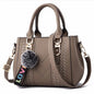 Sac à bandoulière brodé en cuir – Femme