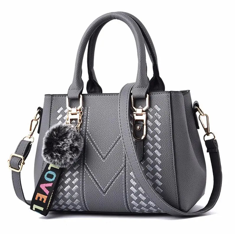 Sac à bandoulière brodé en cuir – Femme
