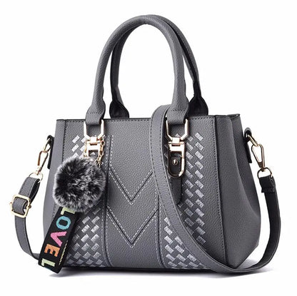 Sac à bandoulière brodé en cuir – Femme